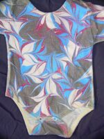 Onesie with freeform blue red black design