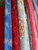 Marbled scarves hanging on a line